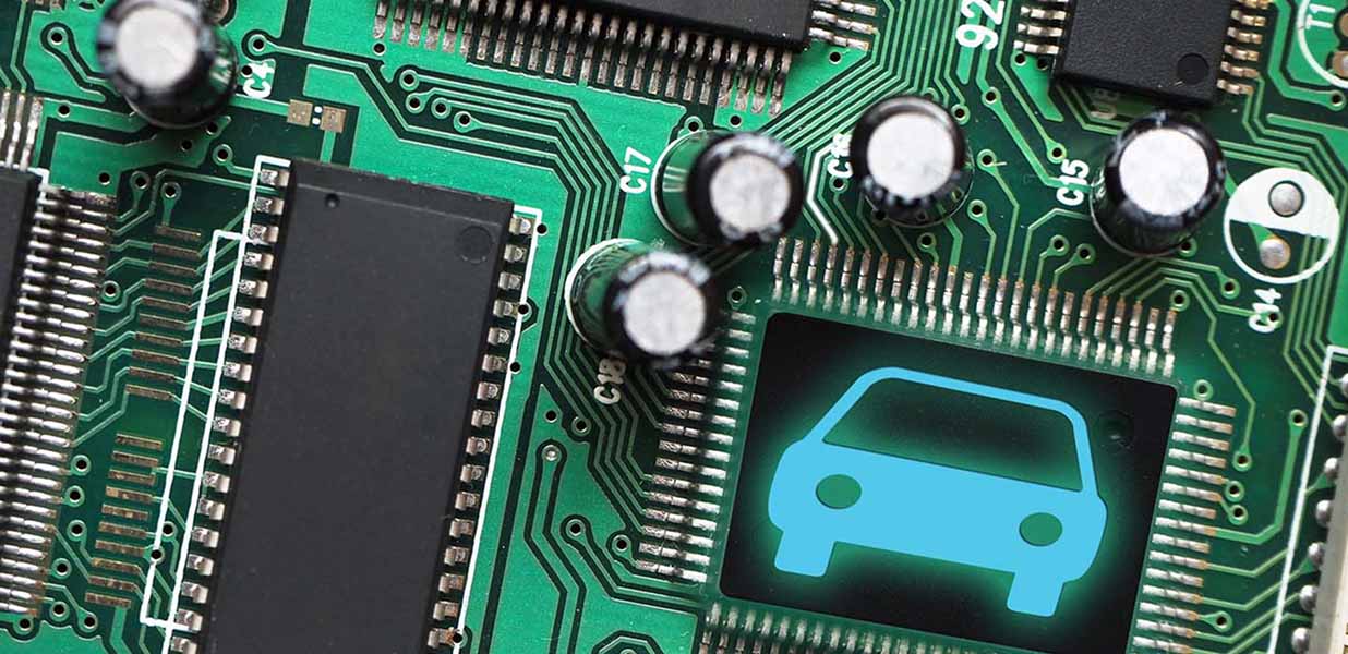 Close up of a microchip with a car icon on it