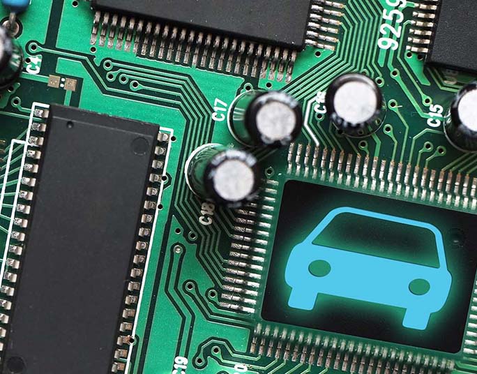 Close up of a microchip with a car icon on it