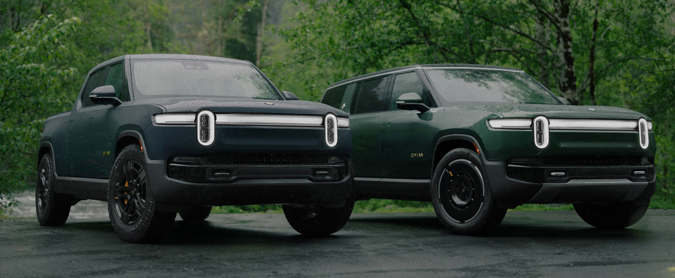 Rivian's second generation of electric vehicles, the R1T pick-up truck and the R1S SUV parked side-by-side