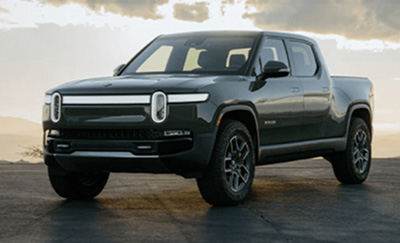 A black Rivian R1T electric truck